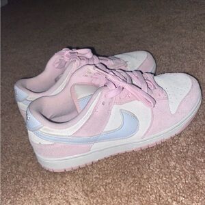 Light pink and white Nike shoes
